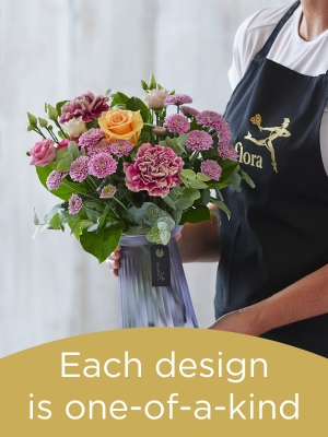 Hand tied bouquet and vase made with seasonal flowers